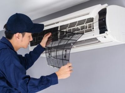 technician-service-removing-air-filter-air-conditioner-cleaning_35076-3617-640x426